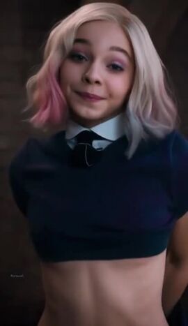 1girls ai_generated blue_eyes breasts enid_sinclair female_only looking_at_viewer multiple_girls nipples orphanxesther realistic removing_clothing school_uniform schoolgirl smiling solo_female video wednesday_(netflix)