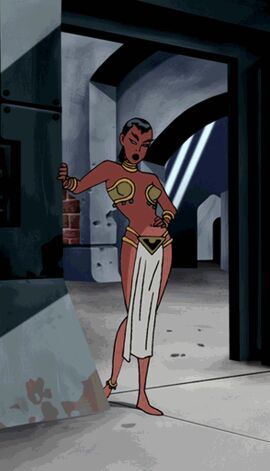 2000s 2000s_(style) 2d alien alien_girl alien_humanoid animated ankle_cuffs anklet bare_arms bare_legs bare_midriff bare_shoulders bare_thighs belly_button bikini bikini_top black_hair black_lips black_lipstick blue_eyes bra bracelet brassiere captured captured_female captured_heroine captured_superheroine cartoon collar dc dc_comics dcau facing_viewer female gold_(metal) gold_anklet gold_anklets gold_bikini gold_bikini_top gold_bra gold_bracelets gold_collar gold_jewelry golden_anklets golden_bikini golden_bikini_top golden_bra golden_bracelets golden_collar green_lantern_(series) green_lantern_corps half_naked harem_girl harem_jewelry harem_outfit hourglass_figure hourglass_figured_female justice_league justice_league_unlimited katma_tui loincloth metal_collar midriff navel official_alternate_costume pointed_ears pointy_ears priestess red_skin red_skinned_female rust screenshot short_hair slave slave_bikini slave_collar slave_girl slave_outfit superheroine swaying swaying_hips swaying_loincloth walking walking_towards_viewer western_fanservice white_loincloth