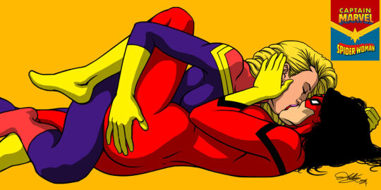 artist_signature ass ass_grab black_hair blonde_hair captain_marvel carol_danvers curly_hair female fit fit_female jessica_drew kaywest kissing laying_down laying_on_back marvel marvel_comics mask masked masked_female muscular muscular_female spider-woman superheroine yuri