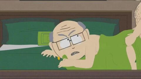 1boy1girl 2006 animated bed bed_sheet bedroom bent_over comedy_central doggy_style earrings glasses lipstick looking_at_partner looking_back mature_male mr_garrison nude nudity official_animation painting richard_dawkins rough_sex sideboob south_park tagme teddy_bear trans_woman video